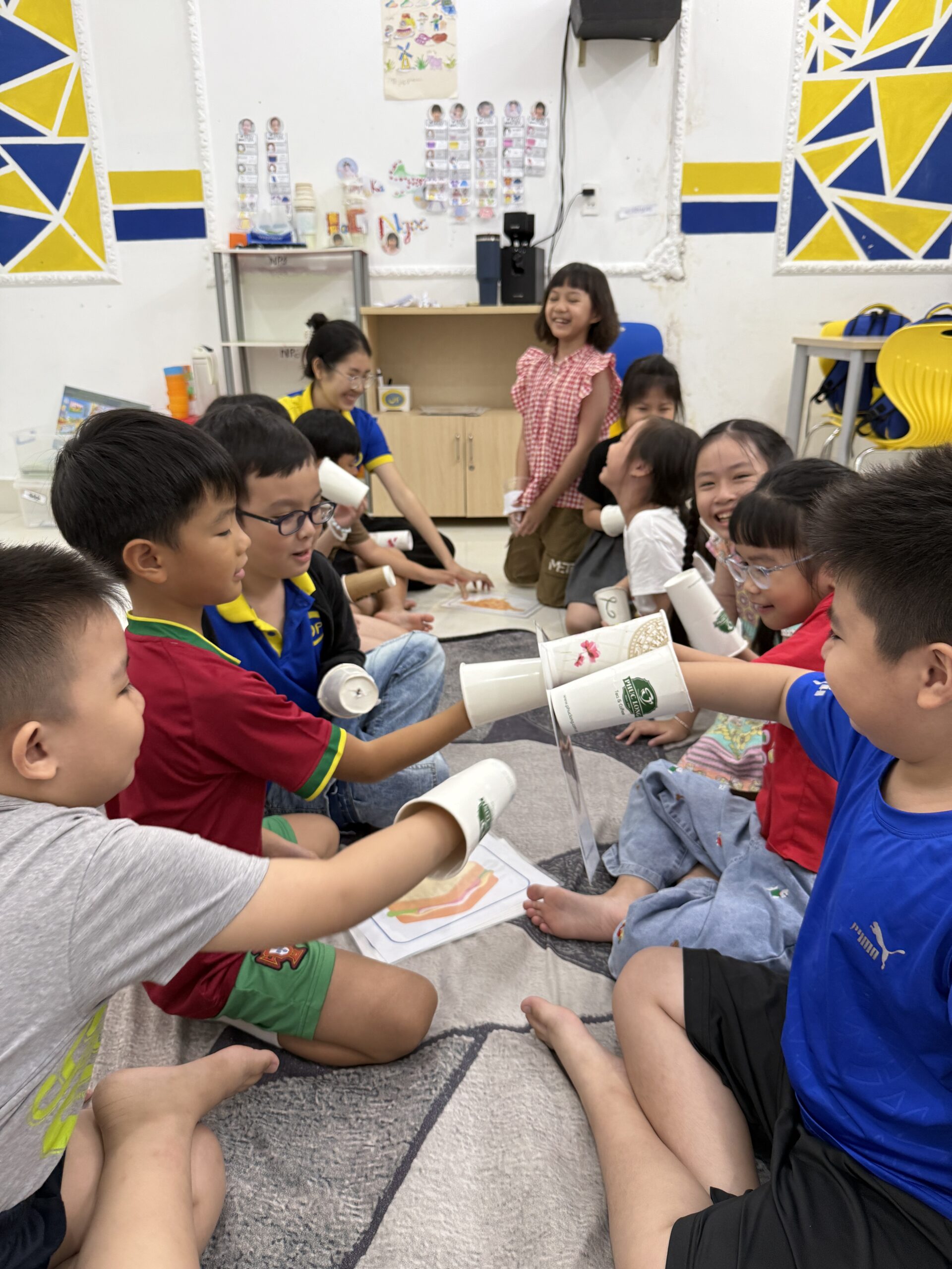 Children learning together through a speaking game